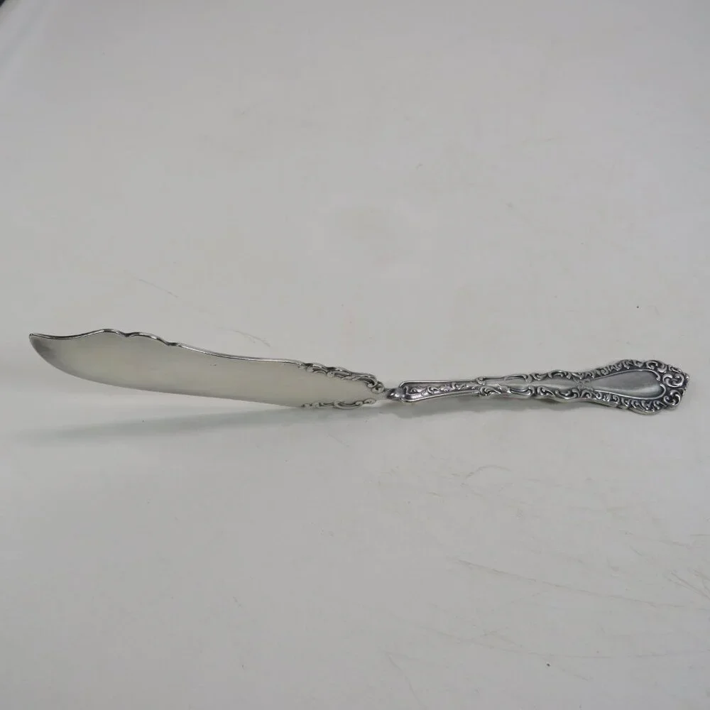 Webster Twisted Handle Butter Knife silver plated S.L. & G.H. Rogers Company A1